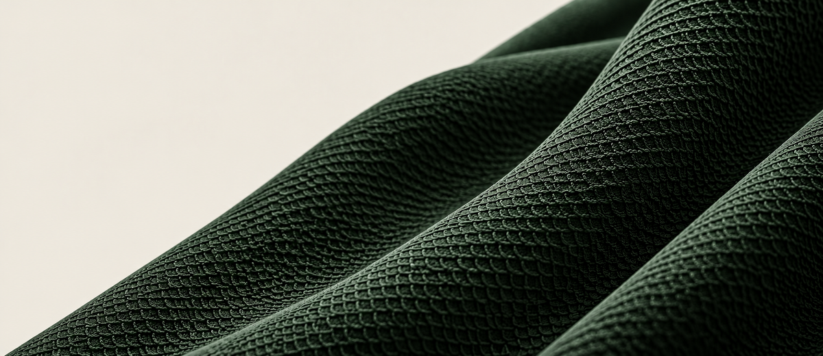 Macro detail of the AeroScale knit, a micro-ventilated fish-scale structure
