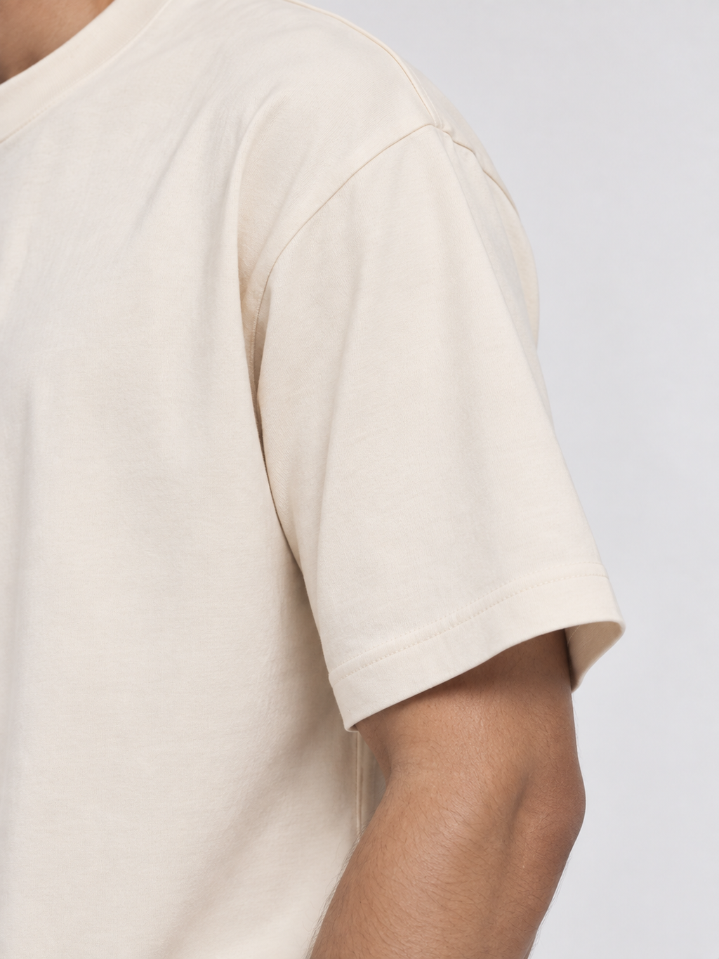 ALTIOR Core Tee in Bone — shoulder and sleeve detail