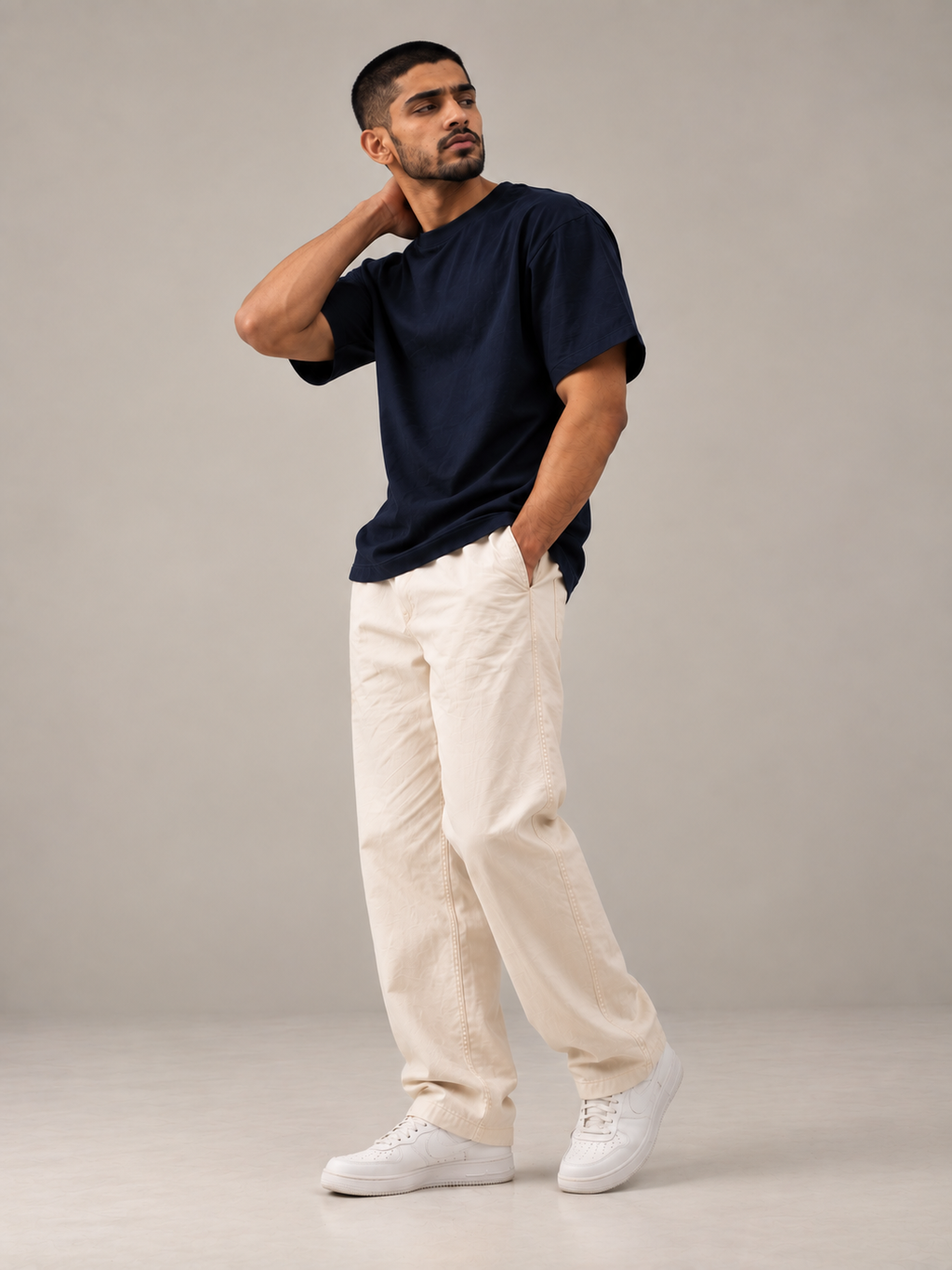 ALTIOR Core Tee in Midnight Navy — front view, candid