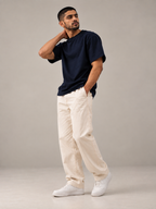 ALTIOR Core Tee in Midnight Navy — front view, candid